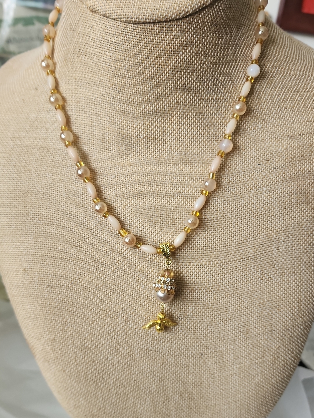 Gold-Tone Pink Beaded Pendant Necklace with Pearl Accent